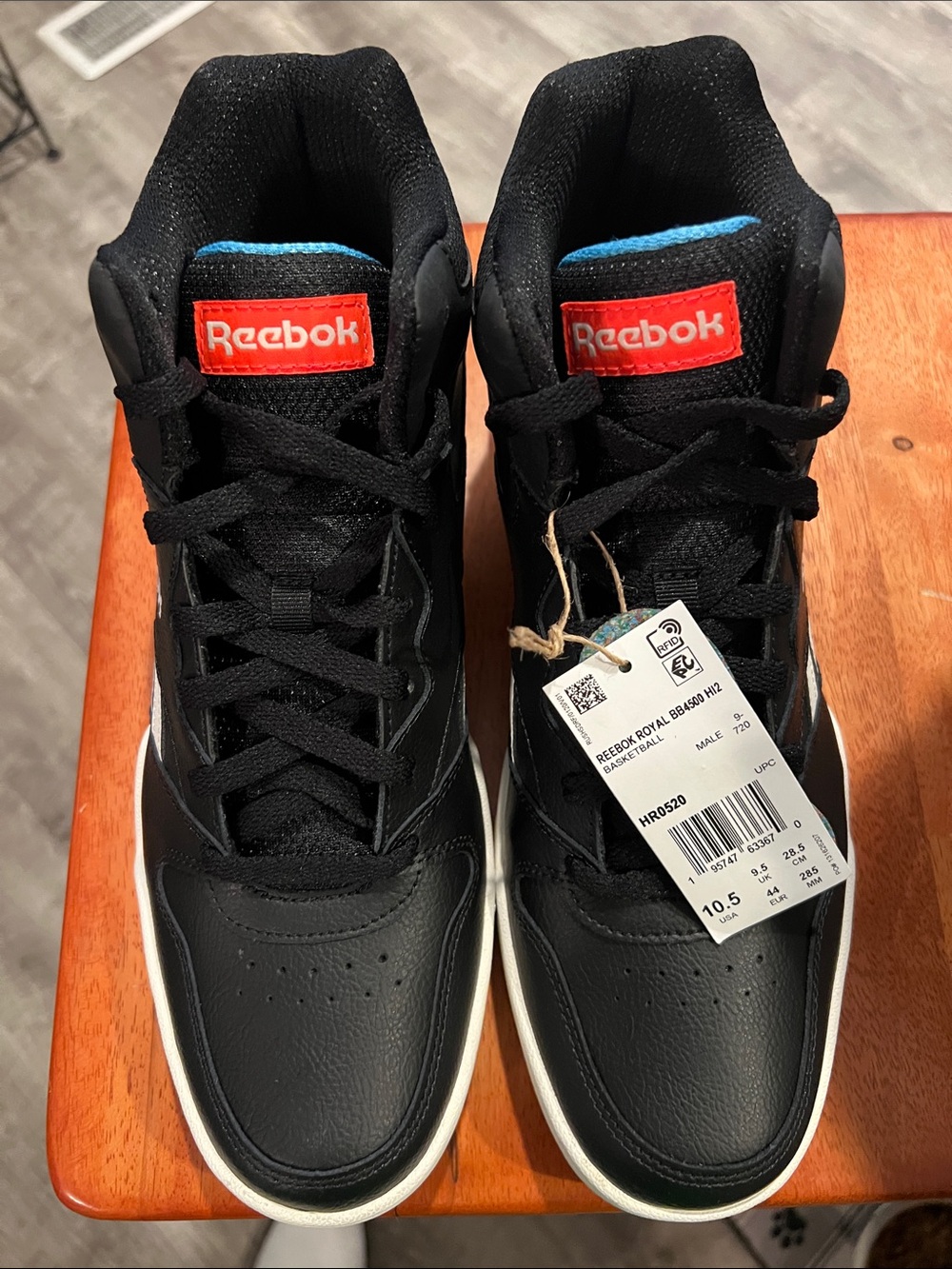 Reebok Men's Black High-Top Sneakers with Red Logo and Blue Tongue Trim